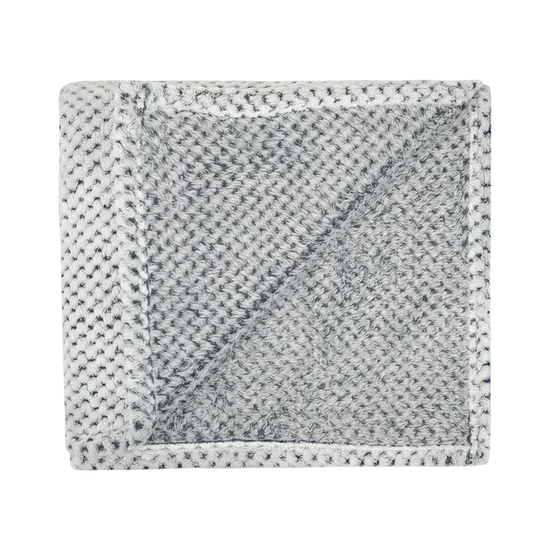 Overhead view of the neatly folded blanket