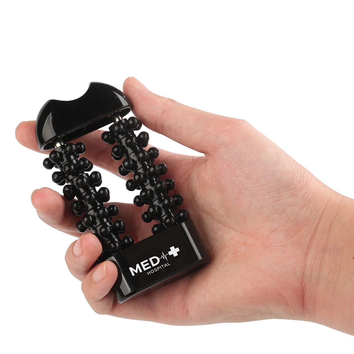 Dual Axis Body Massager in use on a shoulder, promotional massager lifestyle shot