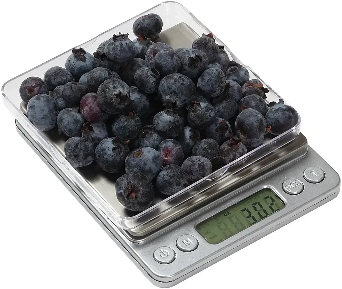 Custom kitchen scale weighing food on the counter