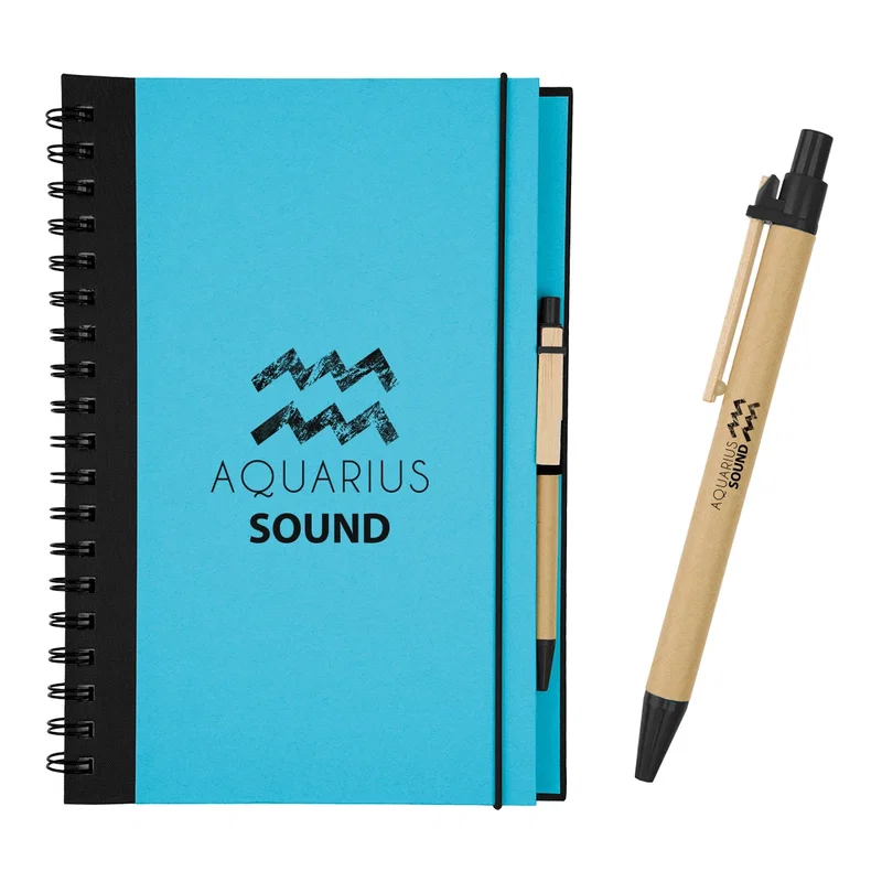 Held up to display the spiral notebook clearly