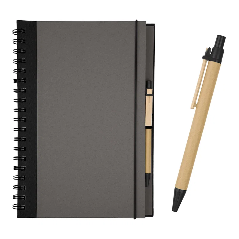 Flat-lay composition featuring the spiral notebook and cover corner