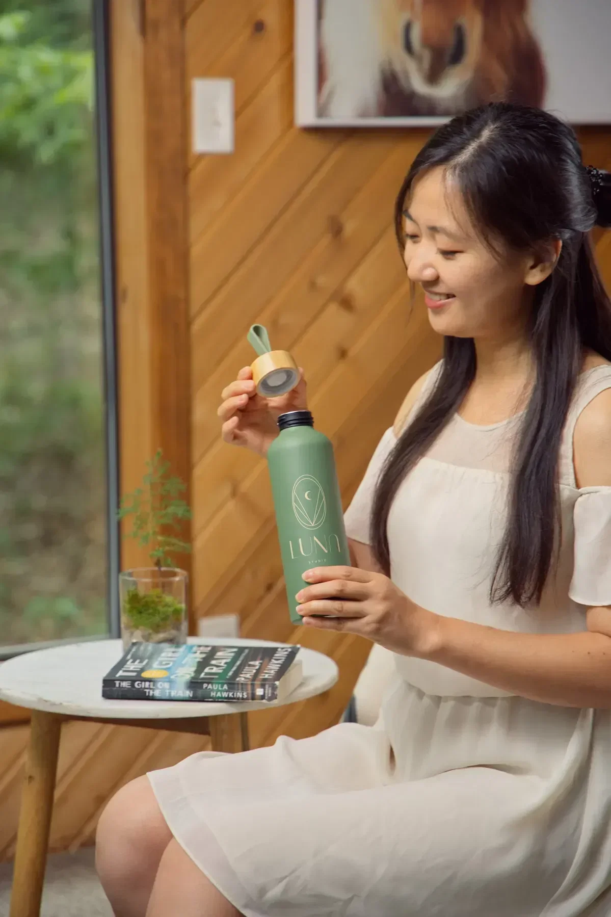 Promotional EcoWave 24 oz aluminum bottle with cap off, detail view