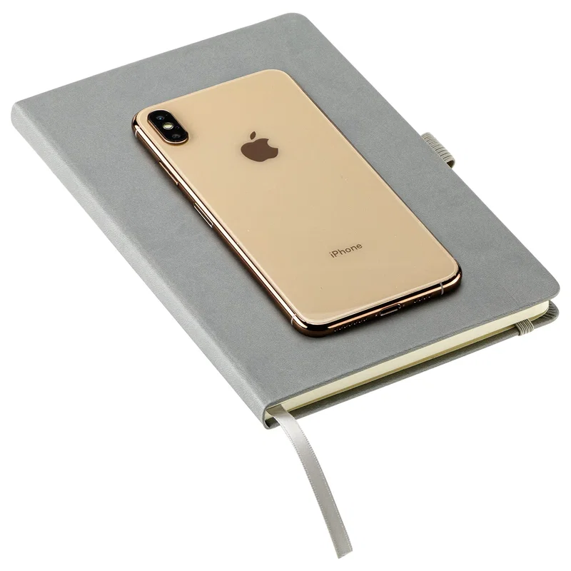 Branded Elan journal angled view highlighting the refined leatherette texture