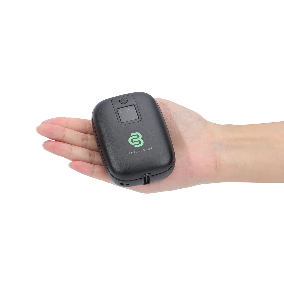 Ember Hand Warmer in use, warming a pair of hands outdoors