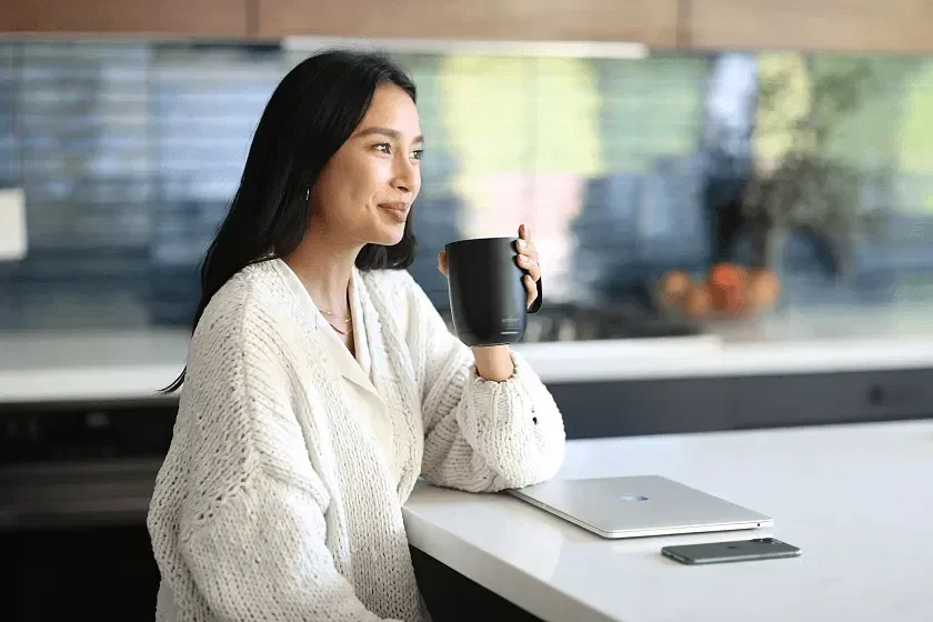 Ember 14 oz Temperature Control Smart Mug held in hand