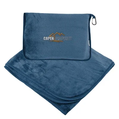 Travel blanket unfolded beside its trolley pillow pouch