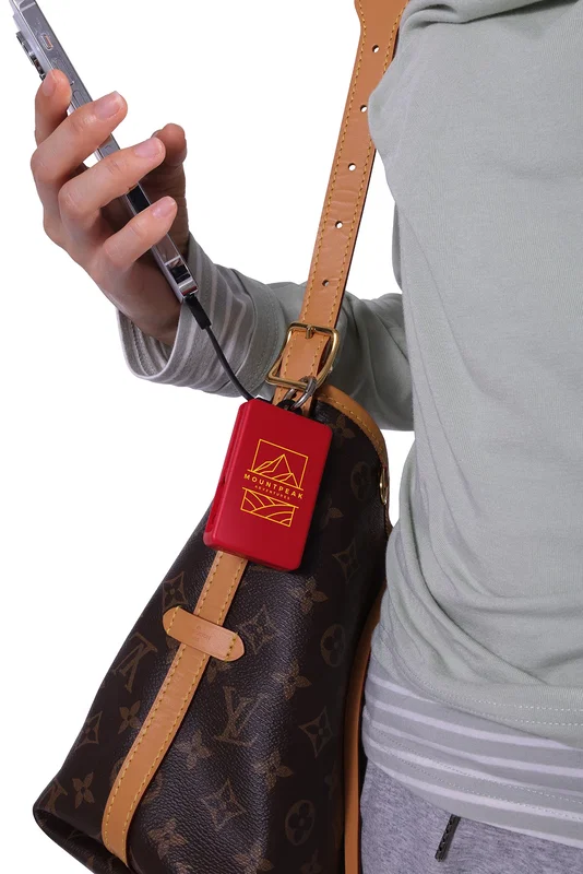 Side profile of the Esprit power bank showing the built-in charging cables