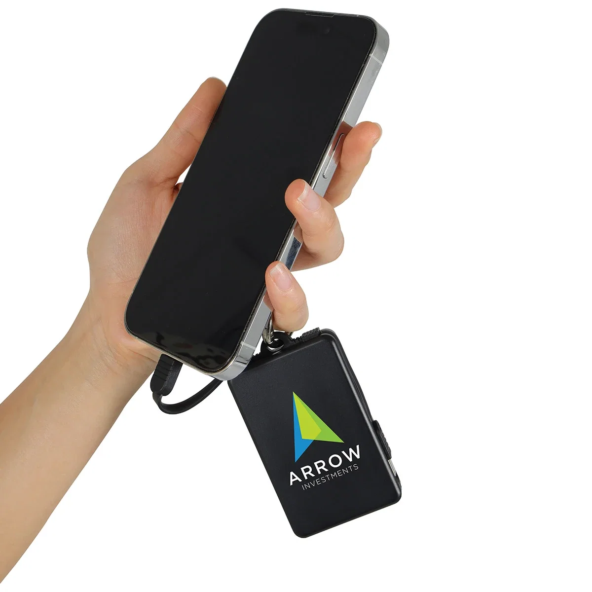 Esprit power bank in use, charging a smartphone with its built-in cable