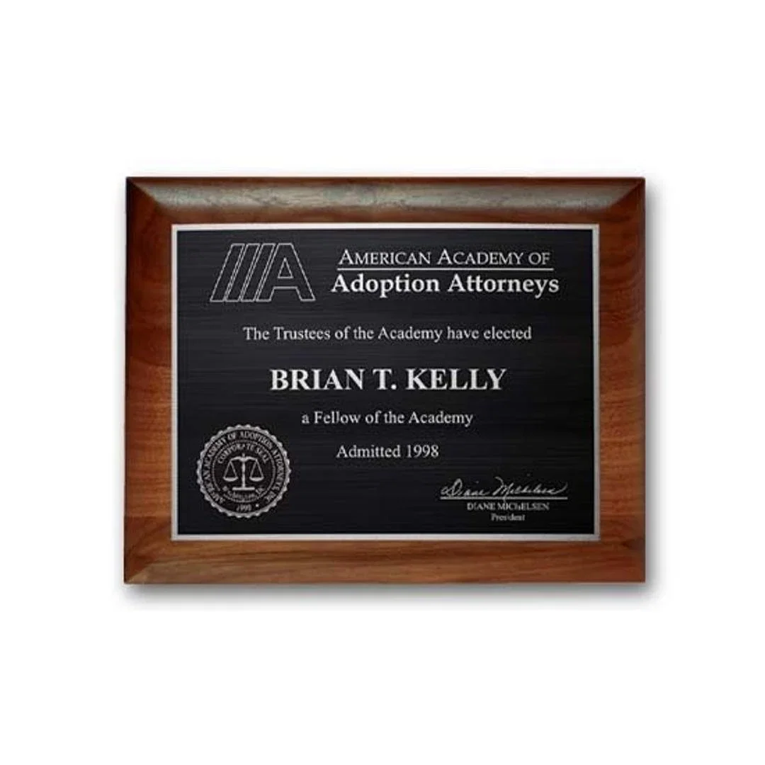 Custom Rolled-Edge Walnut Wall Plaque with Etched and Antiqued Plate for corporate award ceremonies