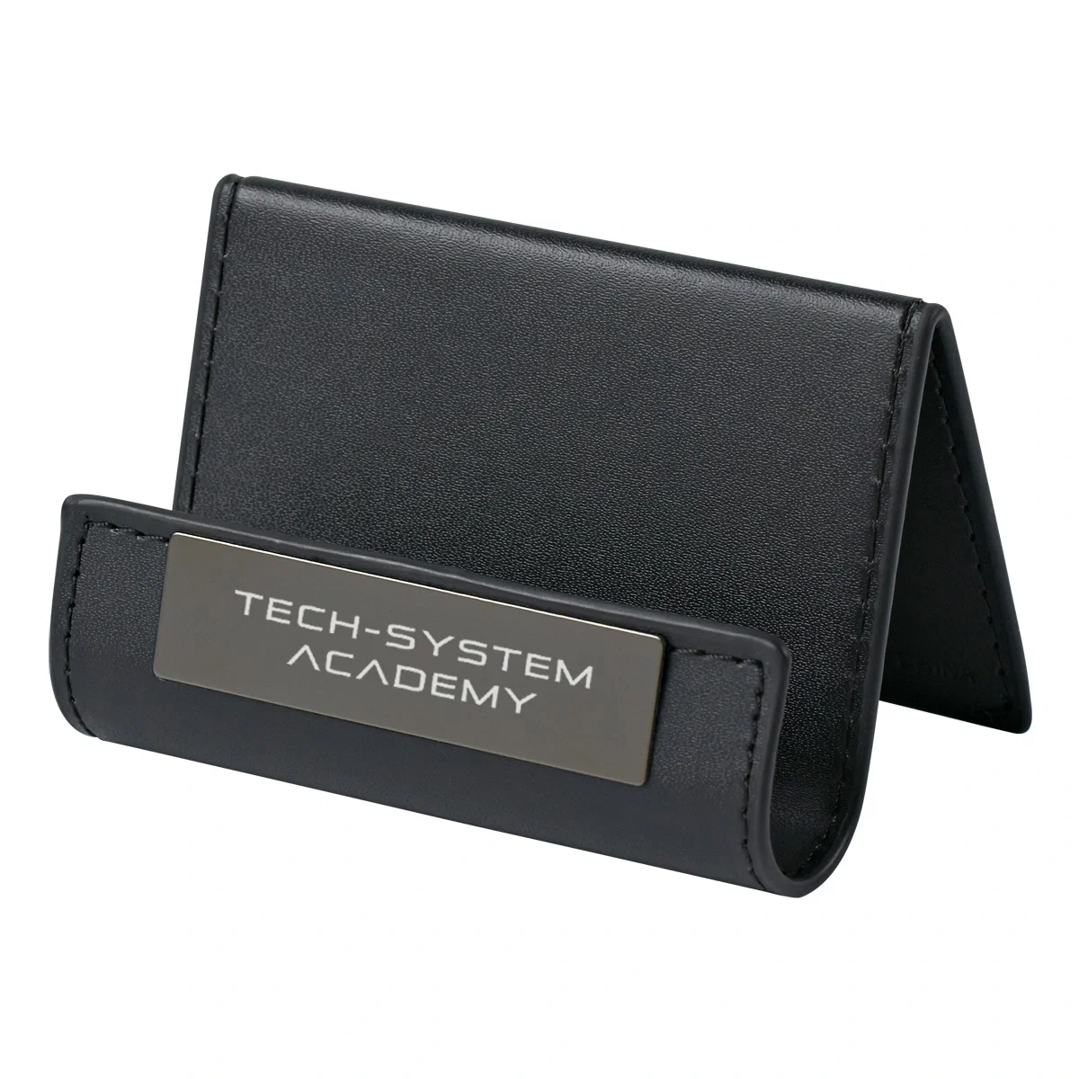 Black desk stand holding business cards beside a device slot