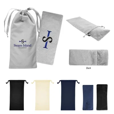 Eye pillow resting beside its polyester drawstring pouch
