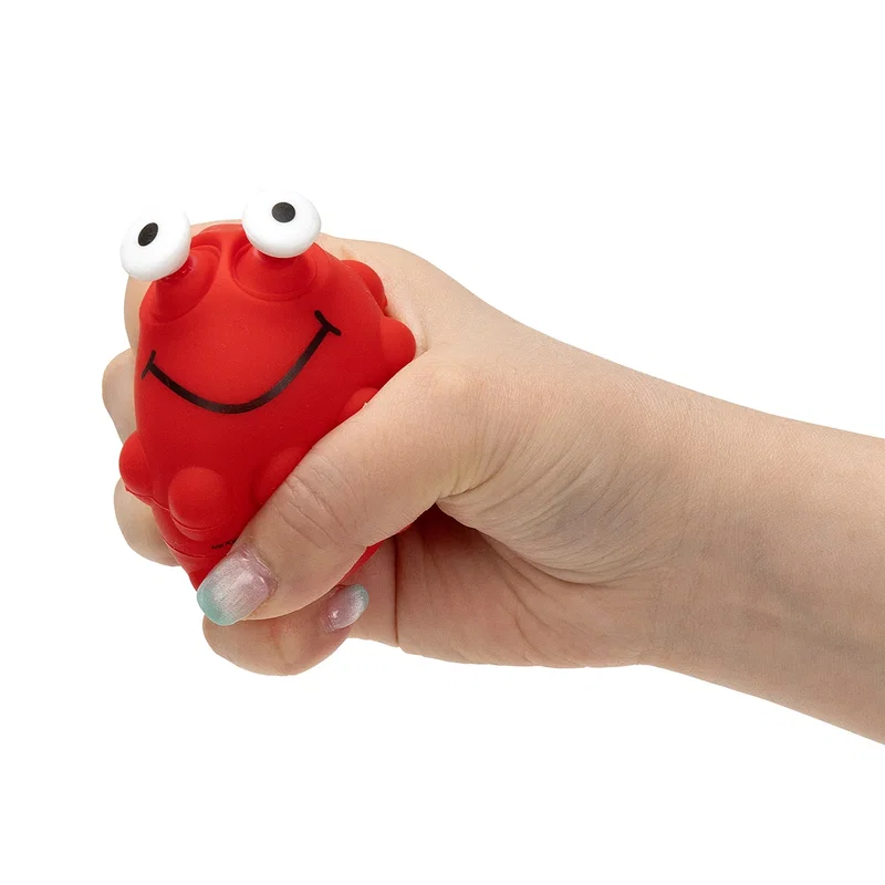 Side profile of the Eye-Popping Push Pop Ball showing the googly eye detail