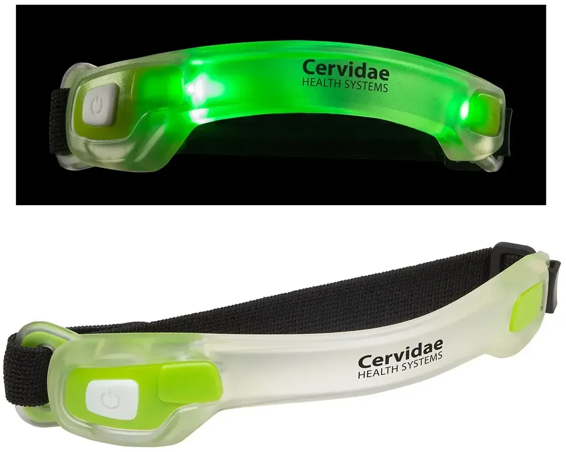 Promotional EZ See safety light glowing on a runner's calf for night visibility