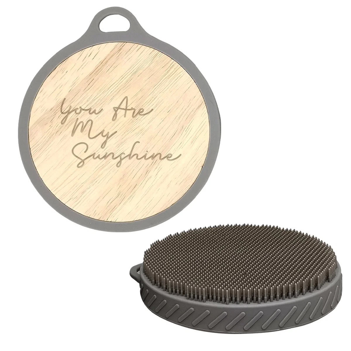 Gray face and body scrub brush measuring two inches across