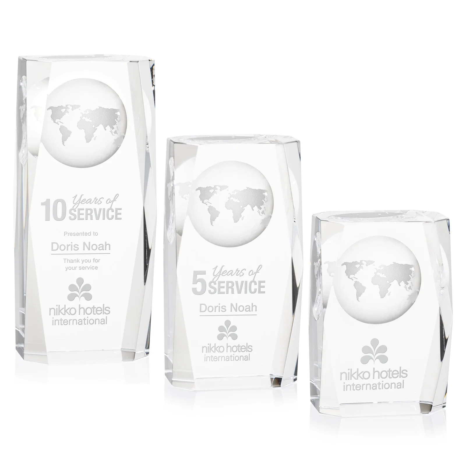 Custom Optical Crystal Tower Award With a Globe Molded Into the Back for employee recognition