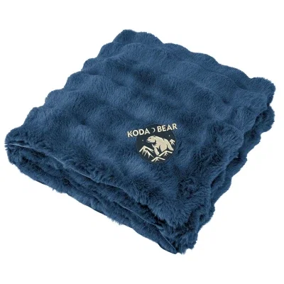 Faux fur throw made from recycled polyester in cream