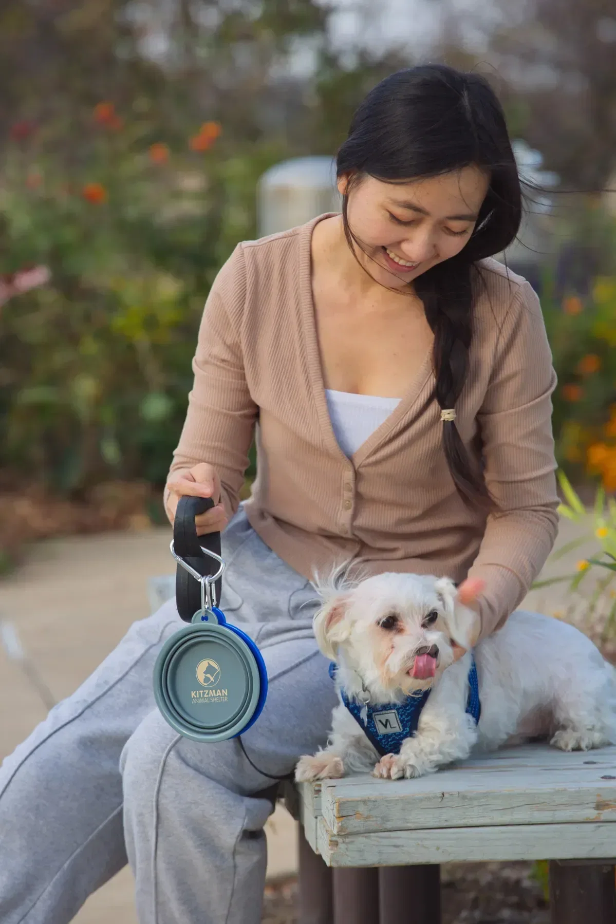 Promotional collapsible pet bowl shown expanded and filled