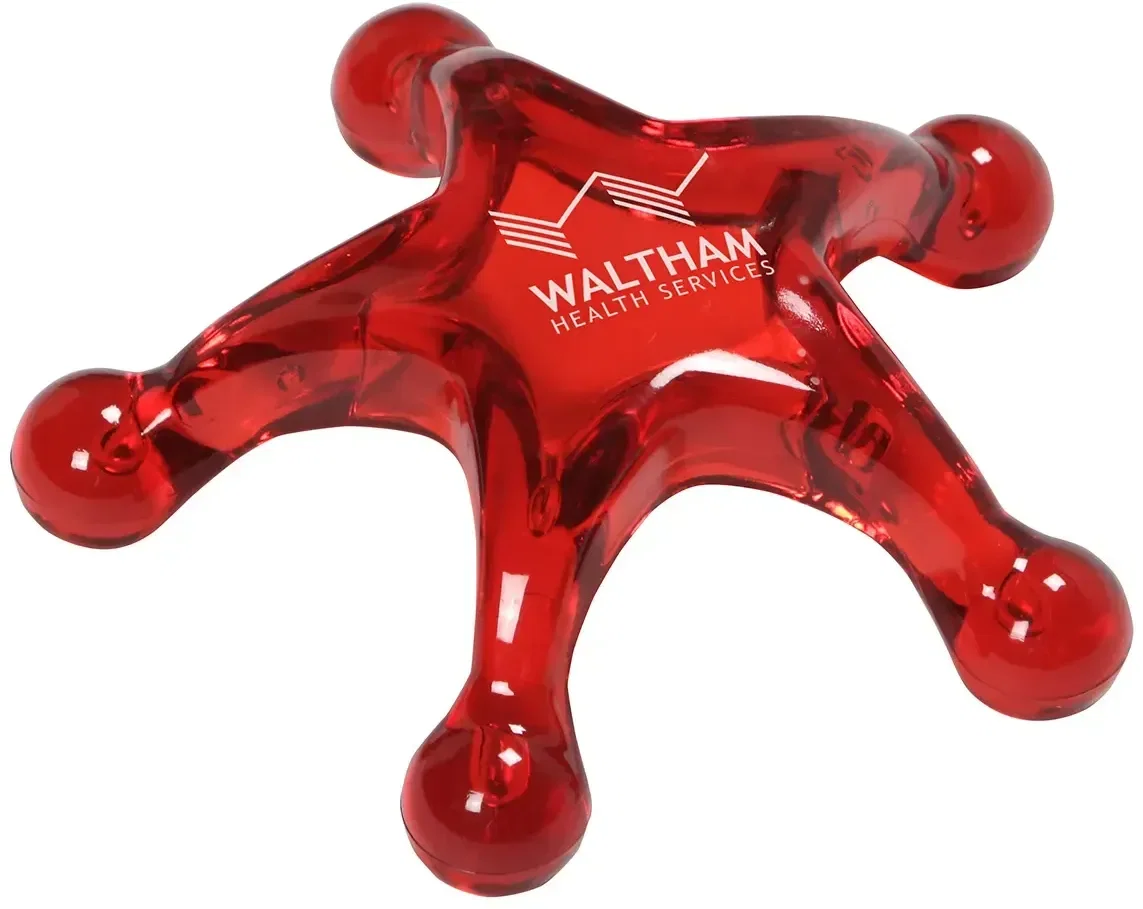 Promotional five-point star massager held in hand to show scale with a branded logo