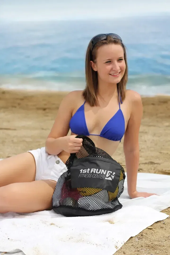 Flex Breathable Mesh Drawstring Bag held in hand