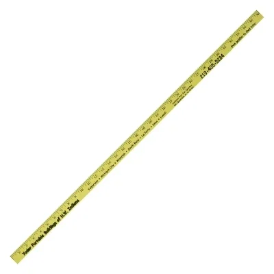 Yellow ruler photographed against a plain white surface