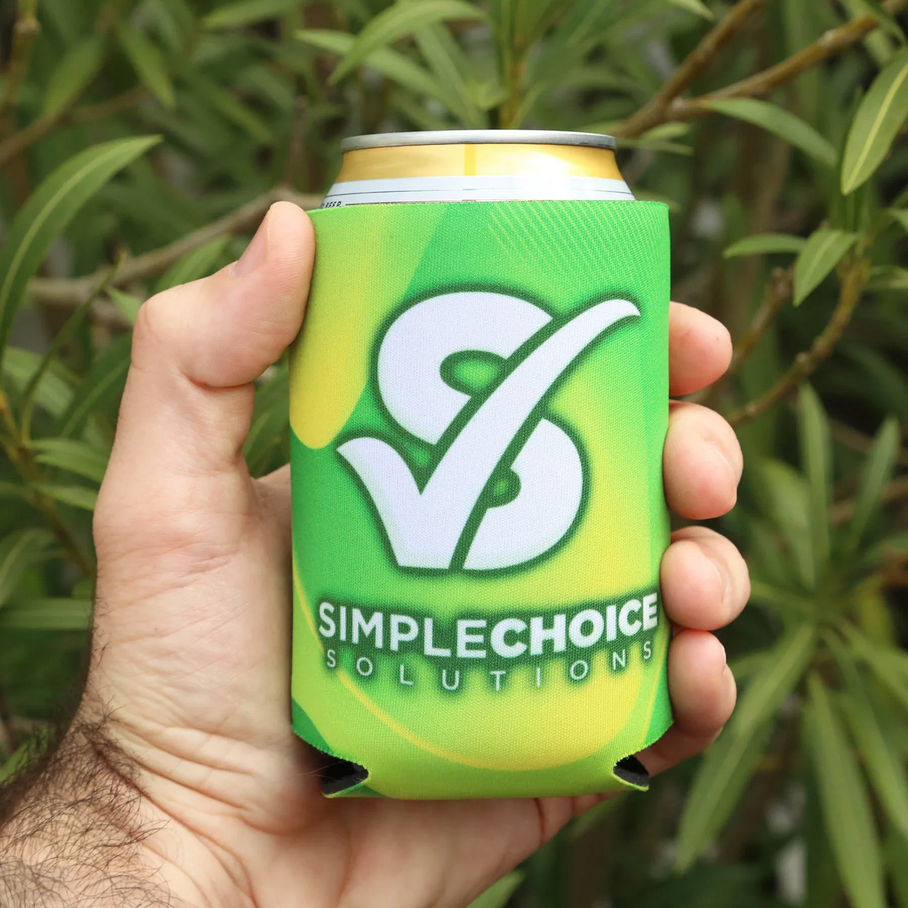 Full Color Neogreen™ Recycled Can Cooler held in hand