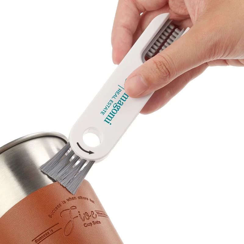 Angled view of the promotional Gap 3-in-1 Cleaning Brush