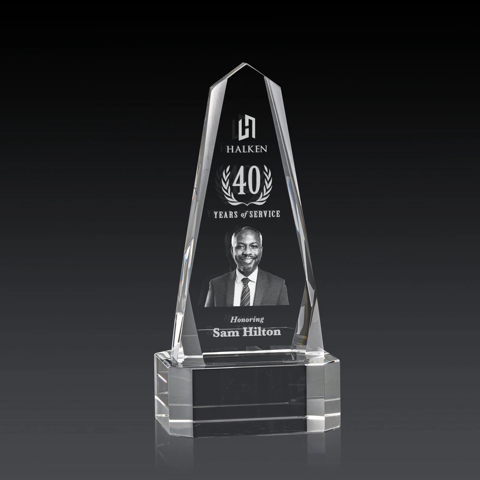 Custom Optical Crystal Obelisk Award with Interchanging Bevels for corporate award ceremonies
