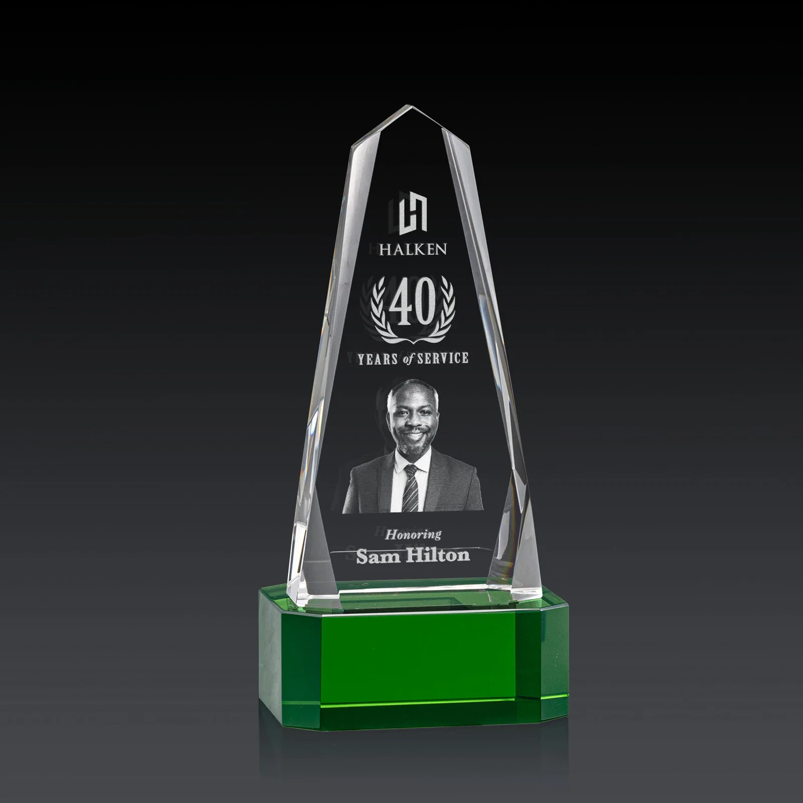 Custom Optical Crystal Obelisk Award with Interchanging Bevels for team milestone celebrations