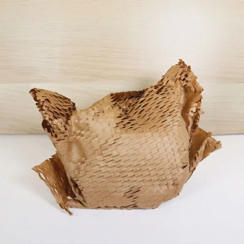 Geometric Wood Planter top view of live succulent in two-toned wood vessel