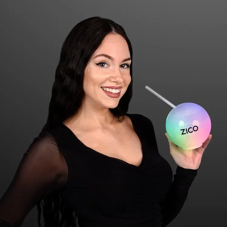 Glow Ball Light Up Tumbler with Straw, Deluxe Base held in hand