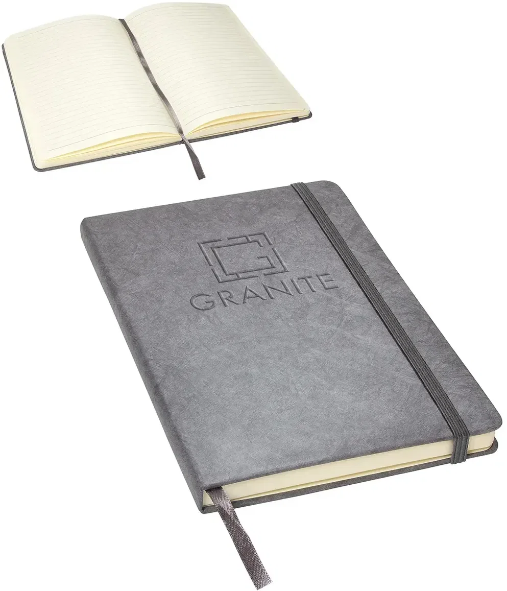 Custom branded granite-finish journal with elastic band, angled view