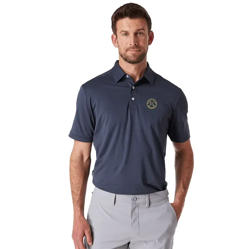 Greatness Wins Men's Athletic Tech Polo being worn