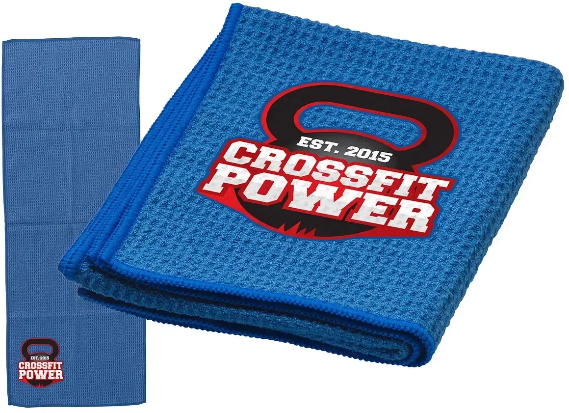 Branded Gridiron microfiber gym towel draped for yoga and golf, logo placement view