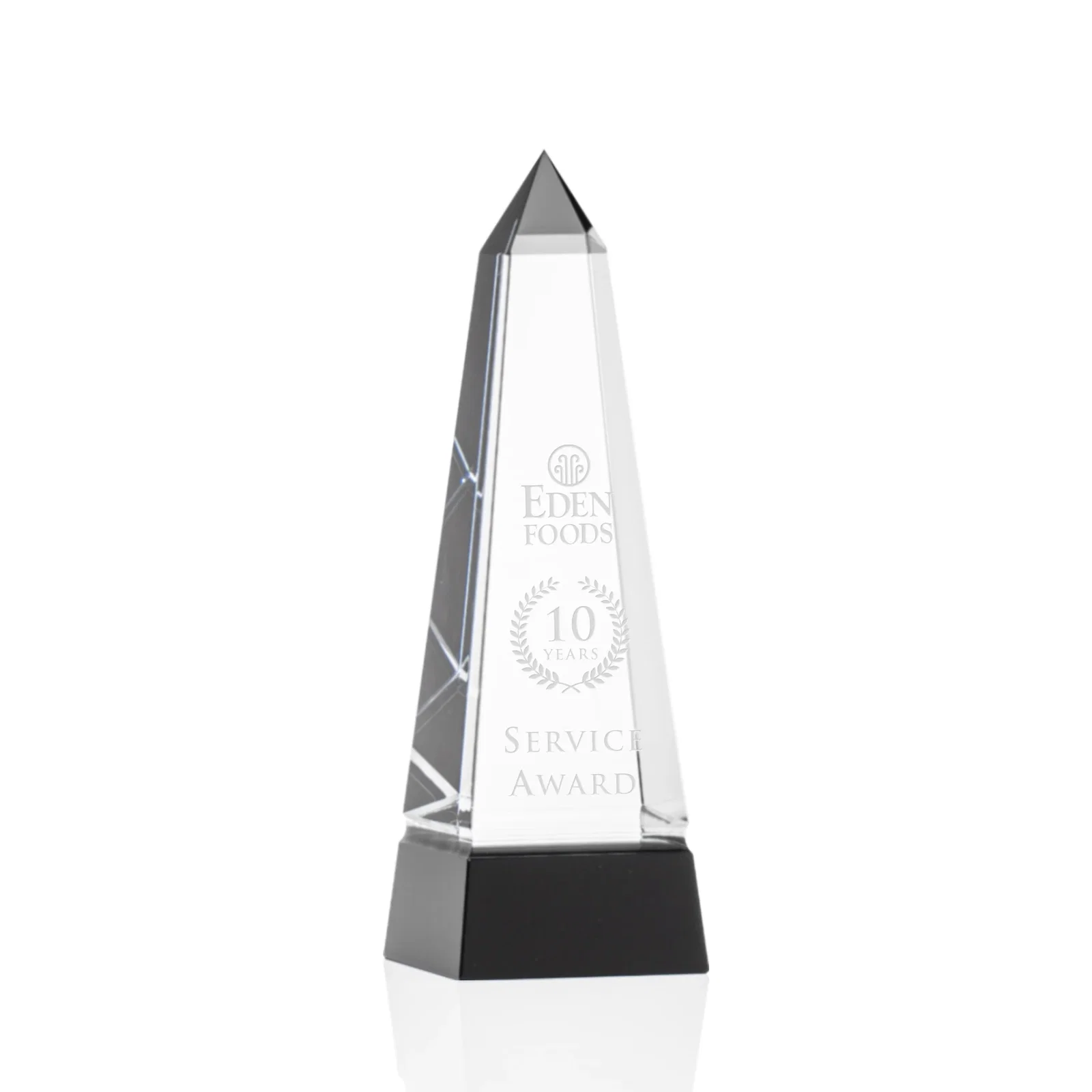 Custom Optical Crystal Obelisk Award with Grooved Sides on Black Base for corporate award ceremonies