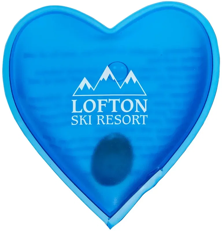 Promotional branded heart hand warmer showing inner metal disk, detail view