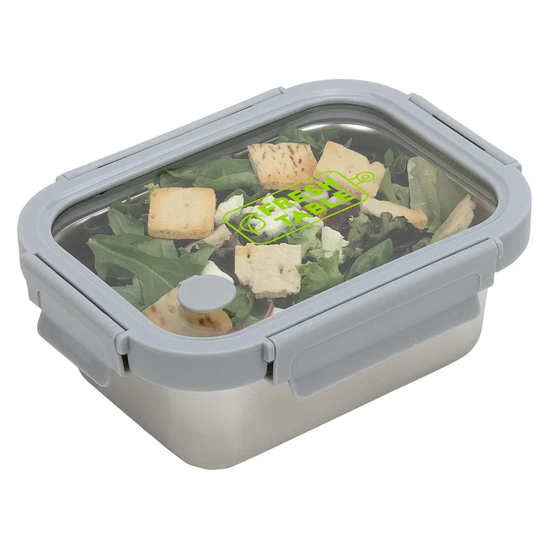 Custom Heat 'N Eat stainless steel lunch box packed with food, lifestyle shot