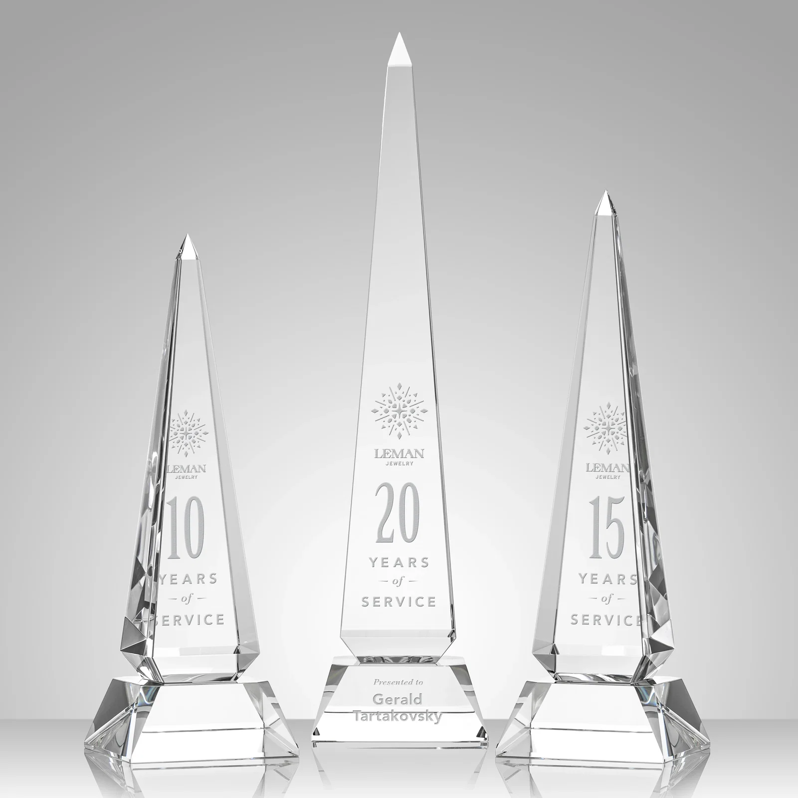 Custom Optical Crystal Obelisk Award with Stepped Taper for employee recognition