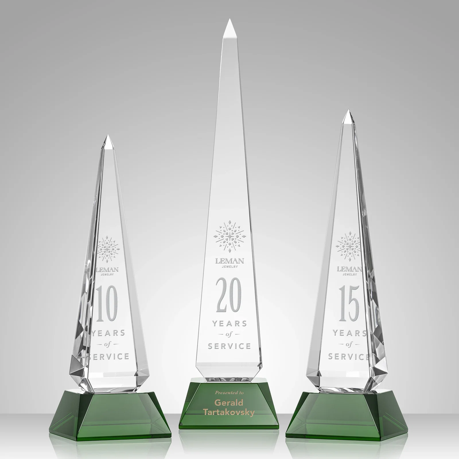 Custom Optical Crystal Obelisk Award with Stepped Taper for retirement presentations
