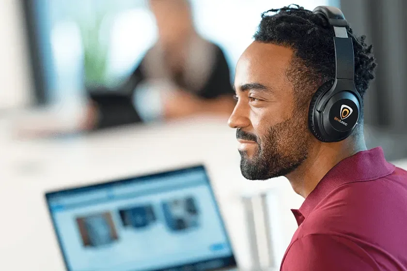 Active Noise Cancellation Bluetooth Headphones being worn