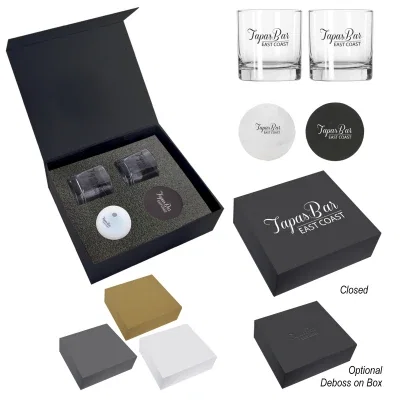 Whiskey gift set with two clear glasses and an ice sphere mold