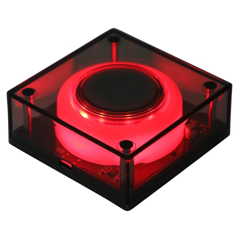 Angled view of the custom Indigo Wireless Speaker showing the light-up base