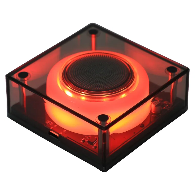 Top-down view of the custom Indigo Wireless Speaker showing the fabric grille texture on top