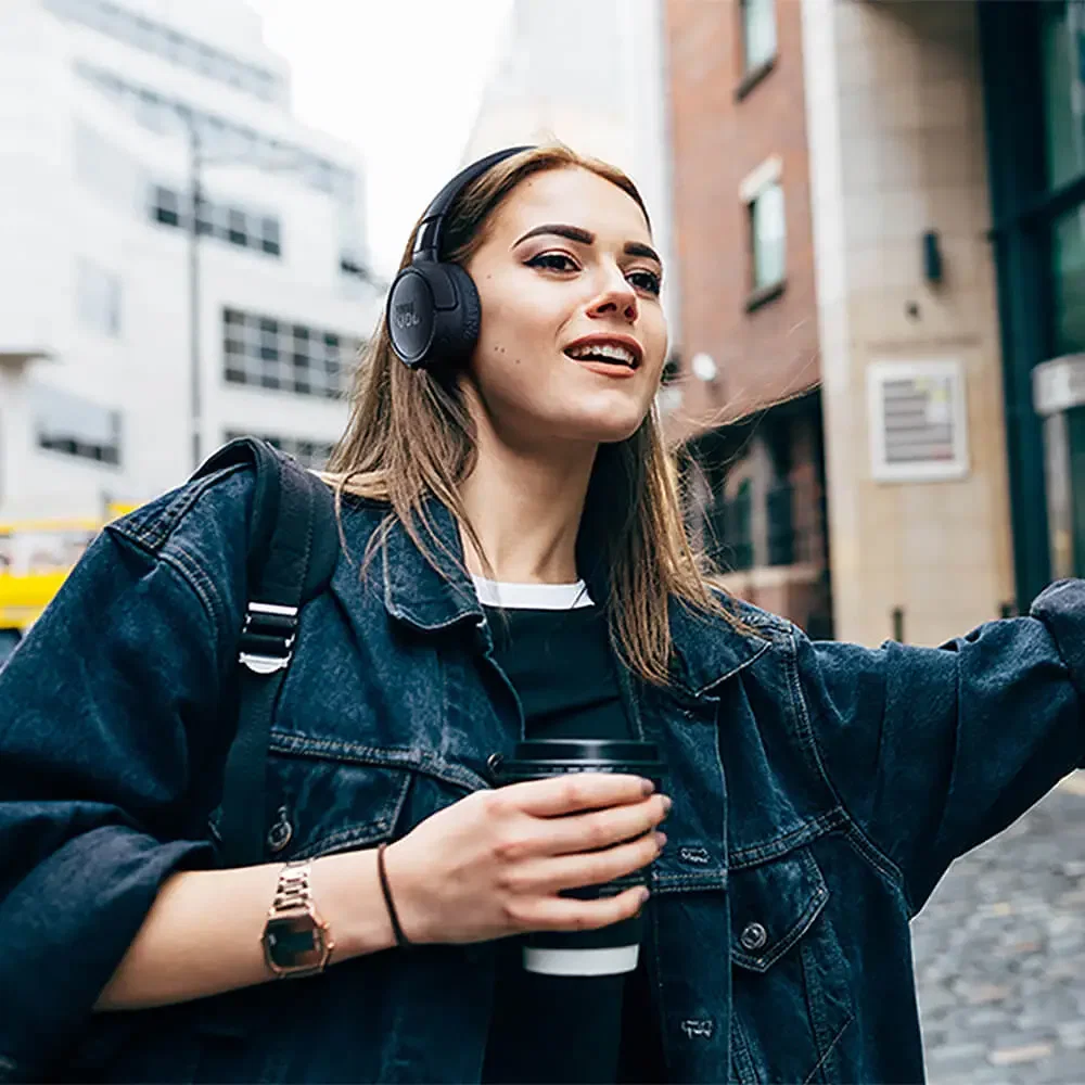 JBL Tune 670NC Wireless On-Ear Active Noise-Cancelling Headphones being worn