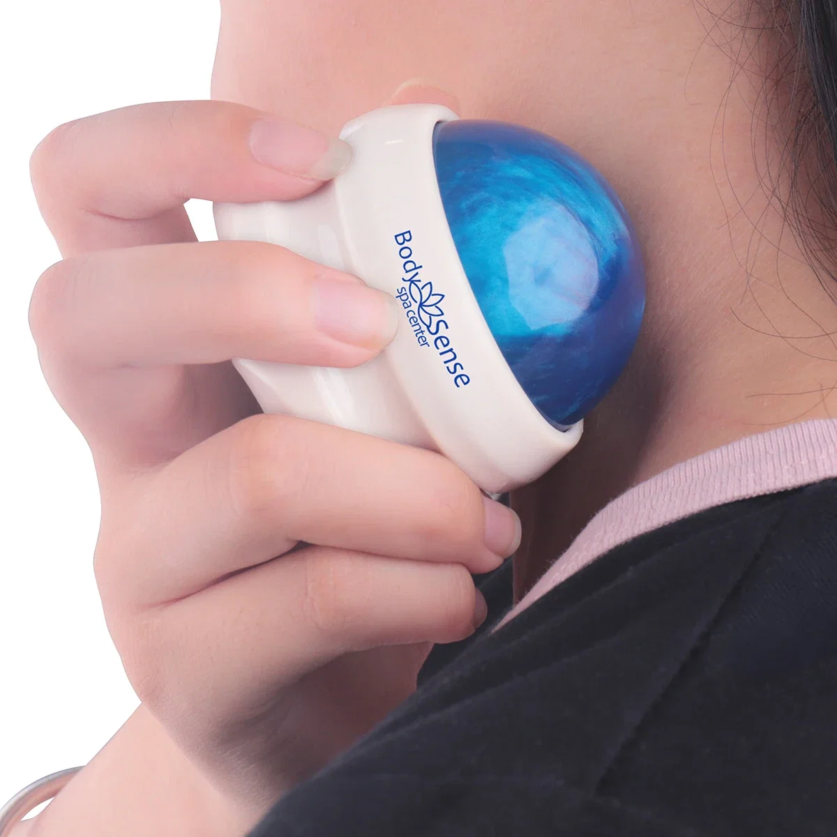 Promotional Kinetic Massage Ball in use, rolling over the hand