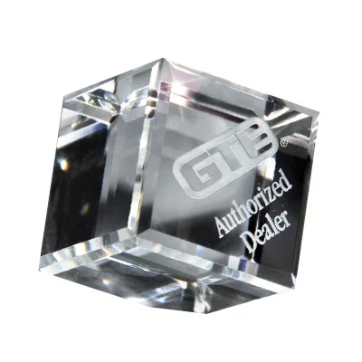 Clear cube award measuring three inches on each side