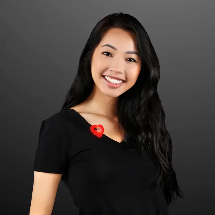 LED Blinking Red Heart Clip being worn