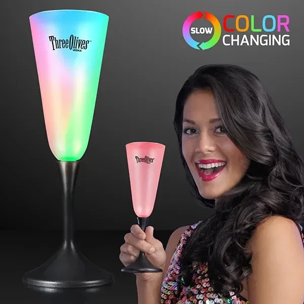 LED Champagne Glass with Classy Black Base held in hand