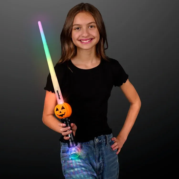LED Pumpkin Toy Sword Expanding Saber held in hand