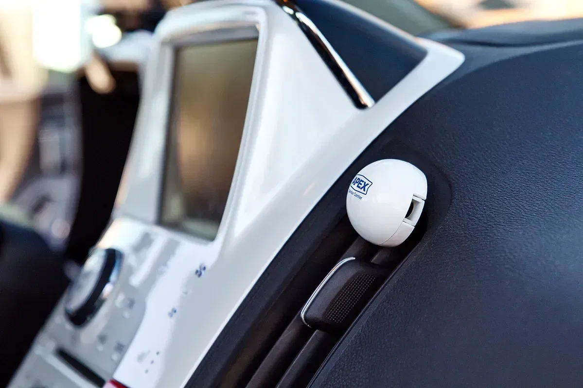 Branded Lemon Scent Car Vent Air Freshener shown inserted in a vehicle air vent, promotional logo-ready auto accessory