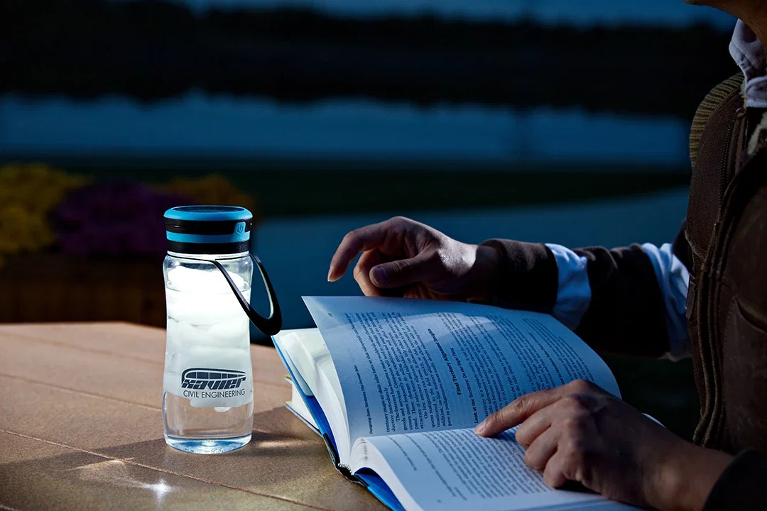 Light-Up Tritan Bottle with Solar Lantern lid, close-up of the solar panel and lantern light